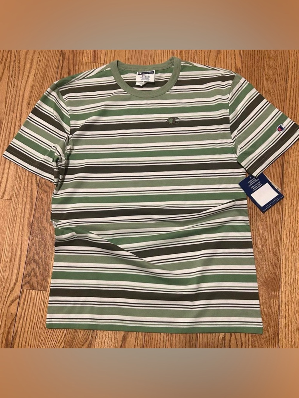 Champion Tee